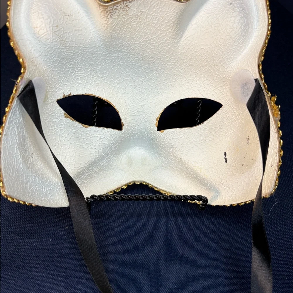 Elegant Gold Cat Mask with Musical Accents
